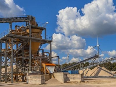 Photo of a sand quarry and heavy equipment