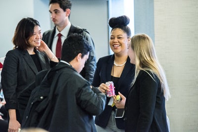 Students talking and smiling