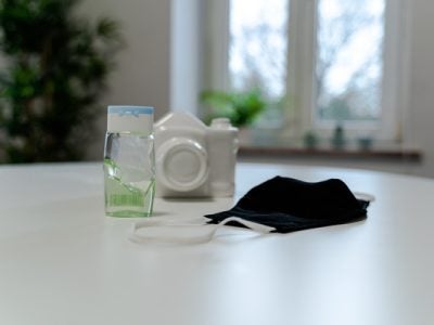 Image of mask and hand sanitizer