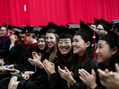 Photo of MMH graduates sitting at Commencement