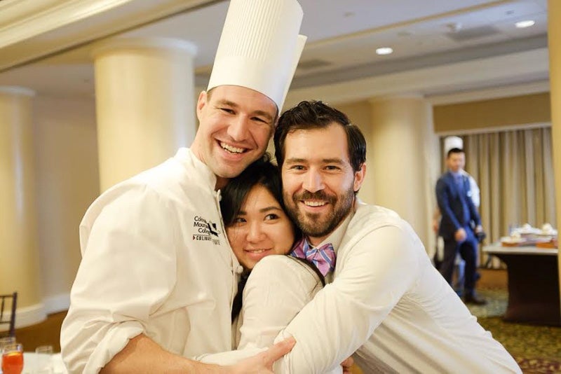 Photo of three students in chef