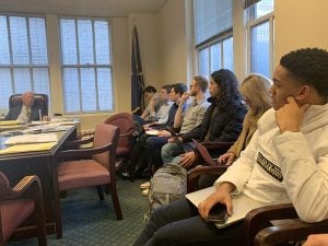 Cornell students observe the arbitration