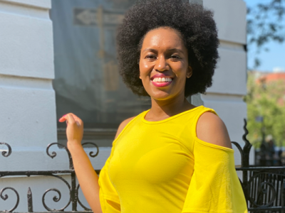 Jessica Ogonor smiling at a gate