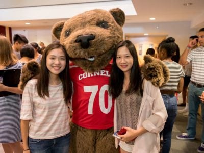 Students with Cornell bear mascot