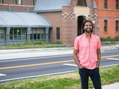 Photo of Parth in front of Sage Hall
