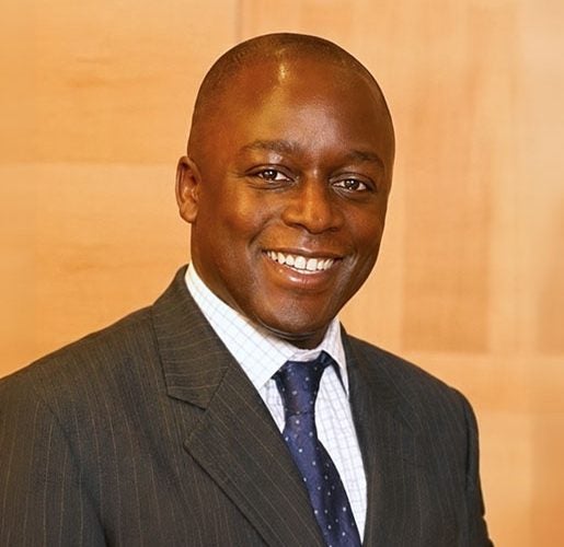 Headshot of Paul Kavuma.