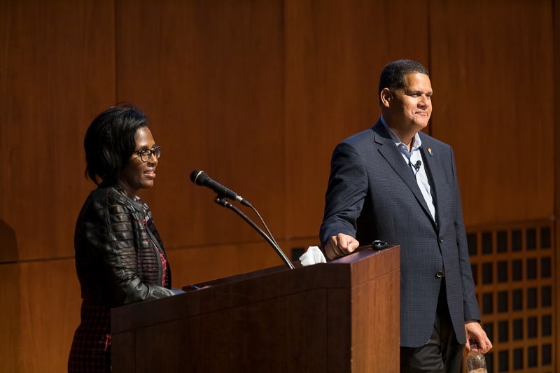 Dean Wooten and Reggie at the podium