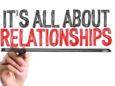 Handwritten sign that says It's All About Relationships