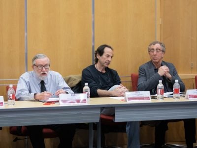 Professors in a roundtable discussion.