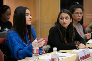 Female student speaks at roundtable.