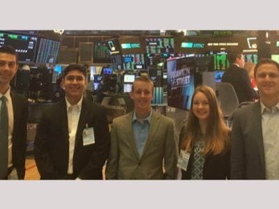 Five interns on the stock exchange floor
