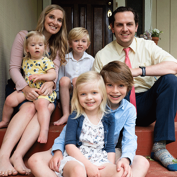 Lacy and Ace Stryker, MBA &rsquo;16, at home with their four children