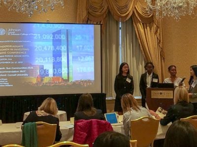 Students present at the Women in Investing Conference in Boston