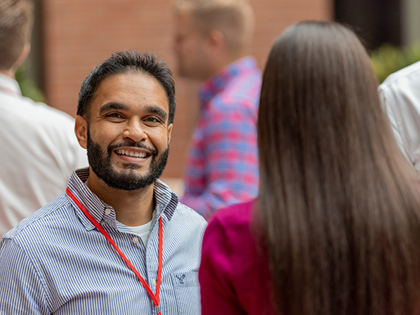 two students talking in an educational setting