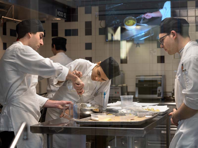 Students working in kitchen