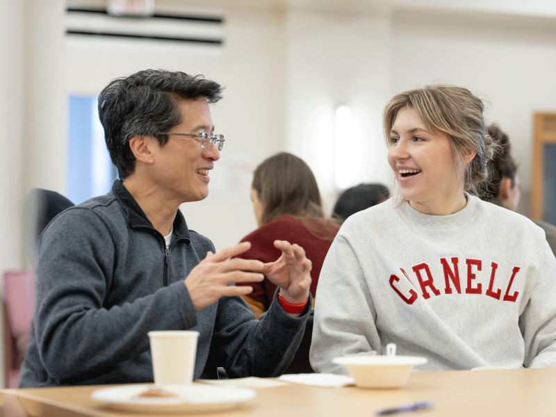 Dyson breakfast with Prof. Shu (male) and female student in a Cornell sweatshirt