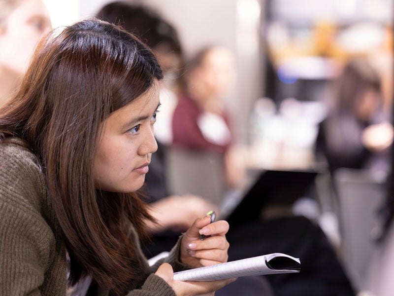 Female student in class.