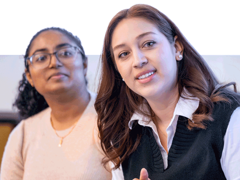 two students listening in class