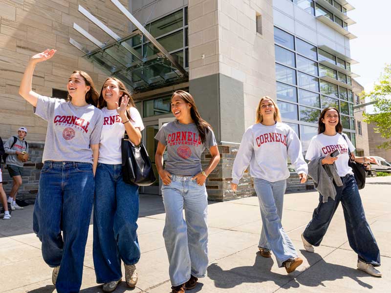 students leaving Statler Hall after classes