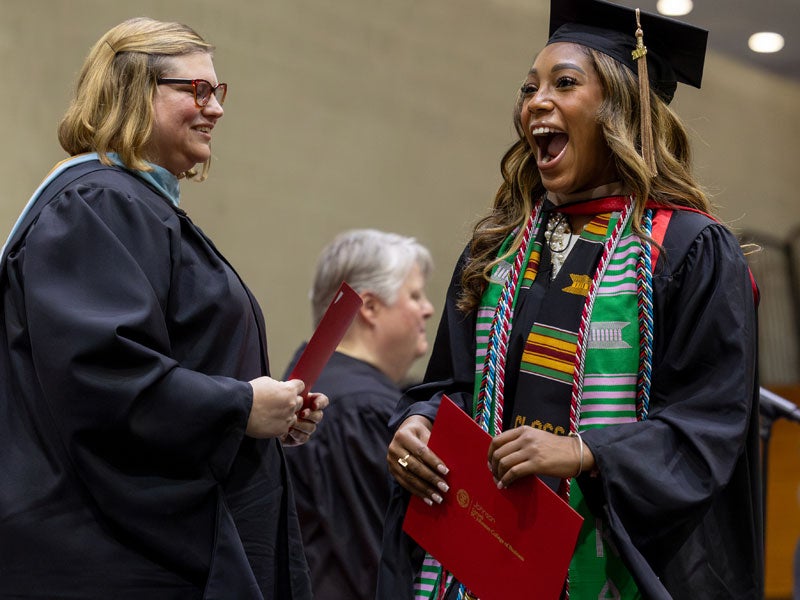 Student receiving diploma