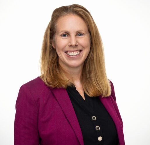 Headshot of Christa B. Downey.