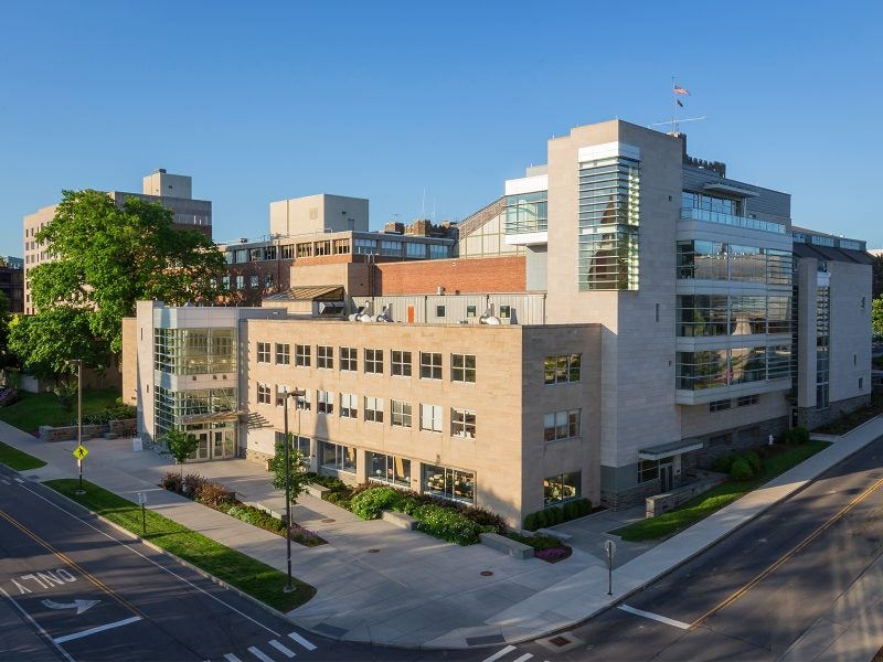 The outside of Statler Hall on a sunny day.
