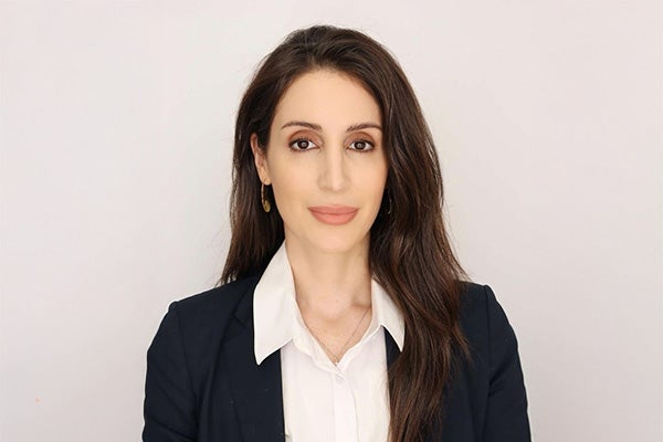 Professional headshot photograph of Katie Pineda