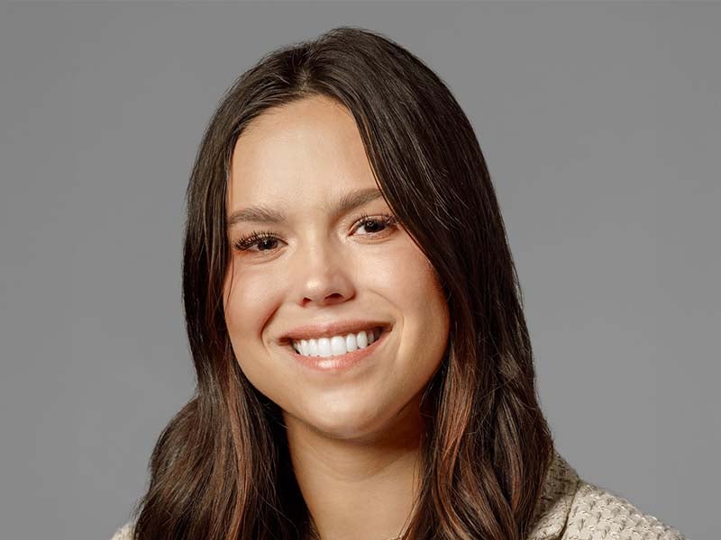 Headshot of Ava Metzger.