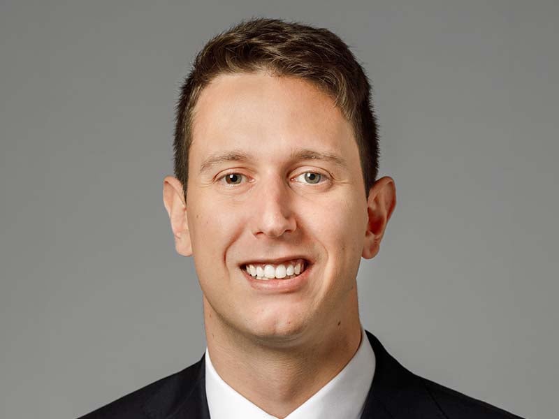Headshot of Benjamin Moss.