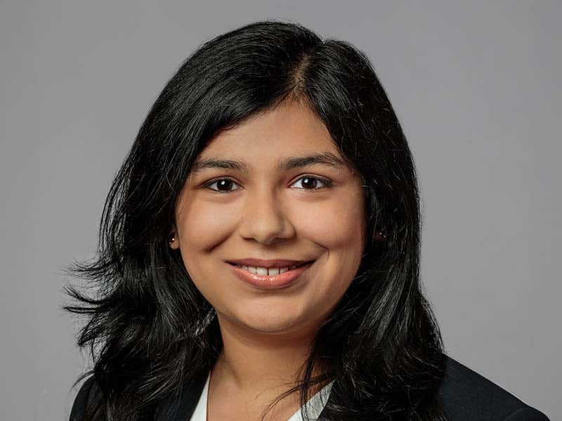 Headshot of Aleezae Nisar.