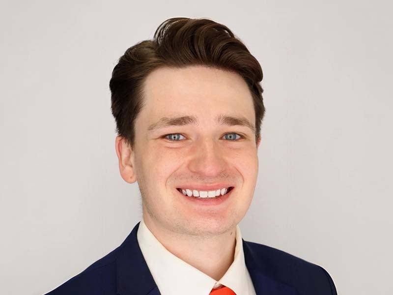 Headshot of Samuel Buckley.