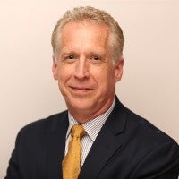 Headshot of Tim Oonk '86.