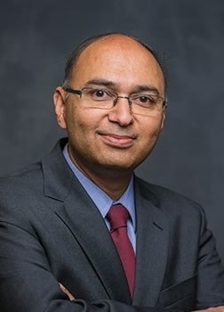 A headshot of Dean Gaur