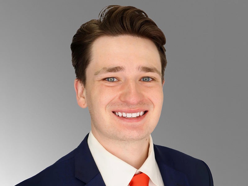Headshot of Samuel Buckley.