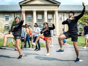 Students from Cornell Bhangra performing on the Arts Quad.