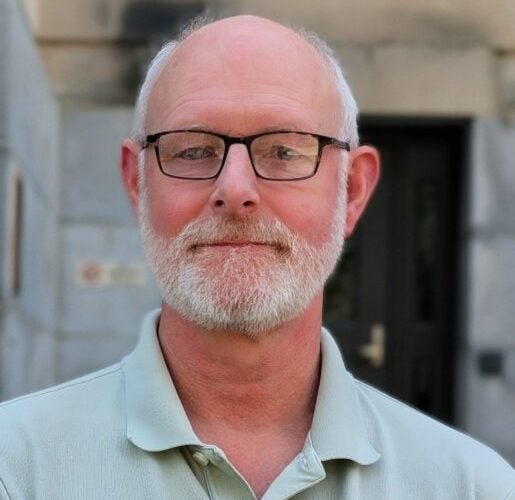 Headshot of Adam Brumberg.