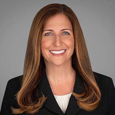 Headshot of Dayna Blank.
