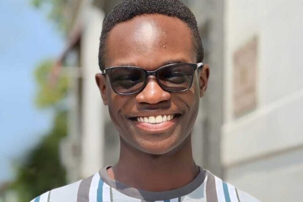 Headshot of Carey Manwa.