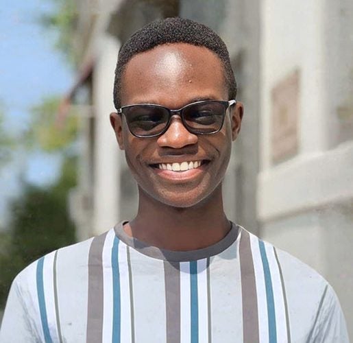 Headshot of Carey Manwa.