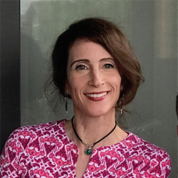 Headshot of Jenny Aker.