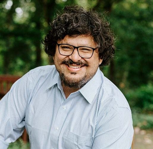 Headshot of Mario Herrero.