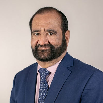 Headshot of Ravi Mehrotra.