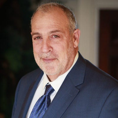 Headshot of Martin F. Scheinman.
