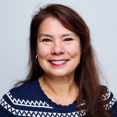 A headshot of Lan Elliott.
