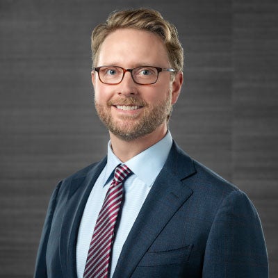 A headshot of Patrick Nichols.