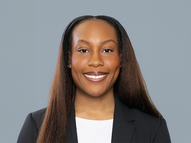 Headshot of Grace-Rebecca Mecha.