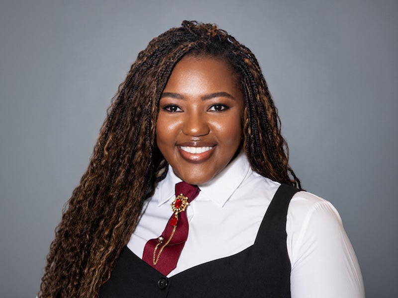 Headshot of Kim McMillian.