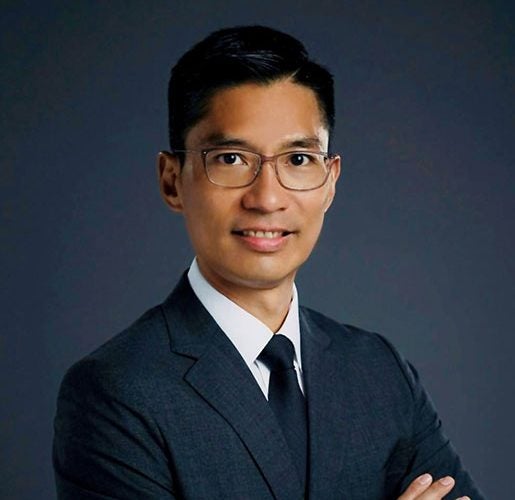 Headshot of Regan Taikitsadaporn.