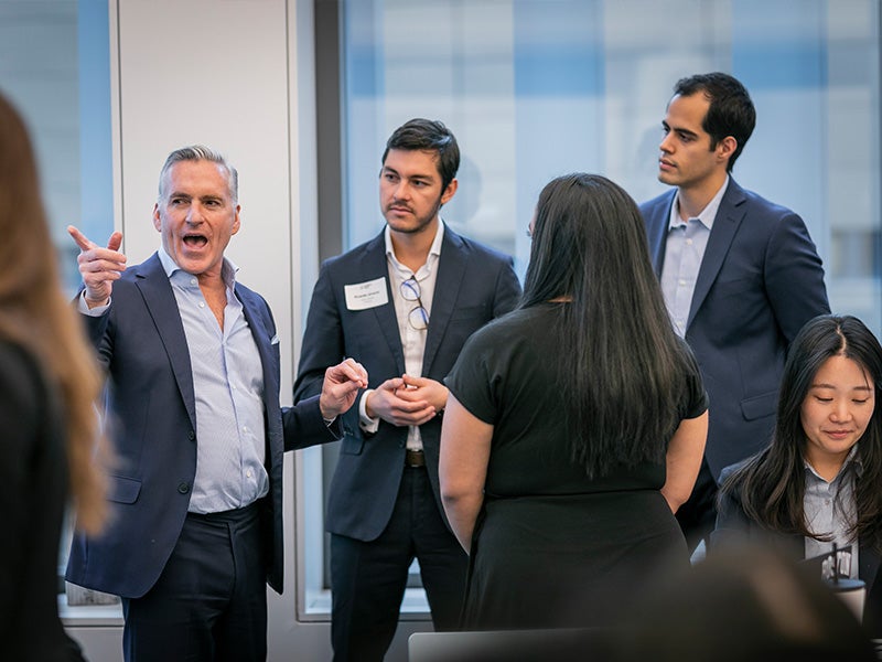 Students at a real estate event.