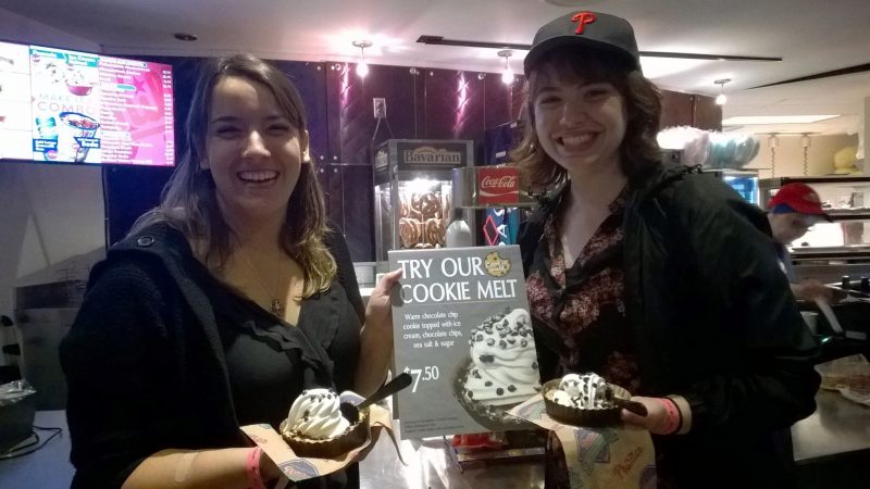 Photograph of Megan Larkin ’17 and Stephanie Cressler ’16 at the Cookie Melt launch their ice cream creations